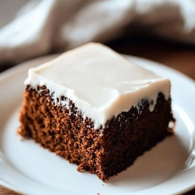 Delicious gingerbread sheet cake topped with frosting and festive decorations