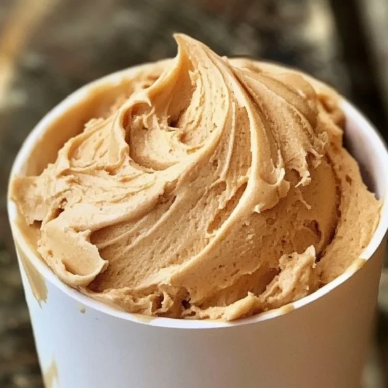 Delicious homemade peanut butter frosting served on cupcakes.