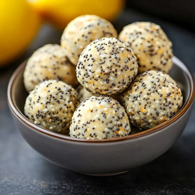 Lemon poppy seed energy bites on a wooden plate, healthy no-bake snack